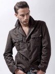 Young male model with brown jacket